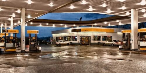 Yellow and Black Gasoline Station Convenience Store An HDR image of a generic gas station and convenience store at dusk immediately after a big rain.